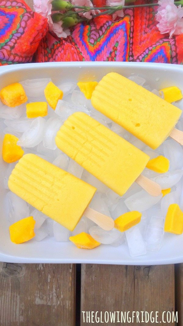 Mango Ginger Popsicles - Refreshing and only 3 ingredients! A healthy summer treat - From The Glowing Fridge