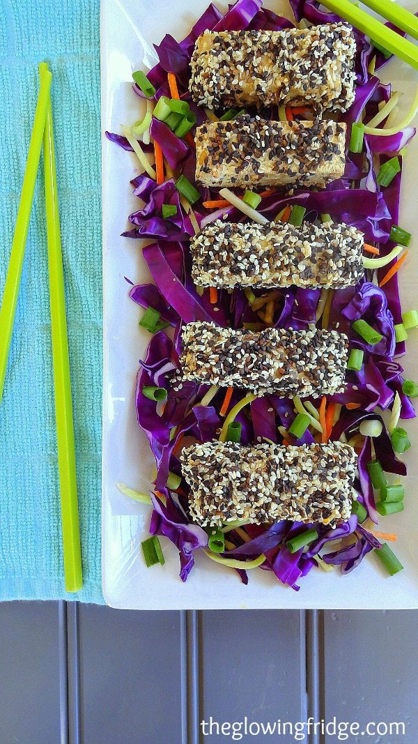 Sesame Crusted Tempeh Sticks - sort of like crispy chicken tenders, but vegan! Served with a citrus soy dipping sauce! From The Glowing Fridge