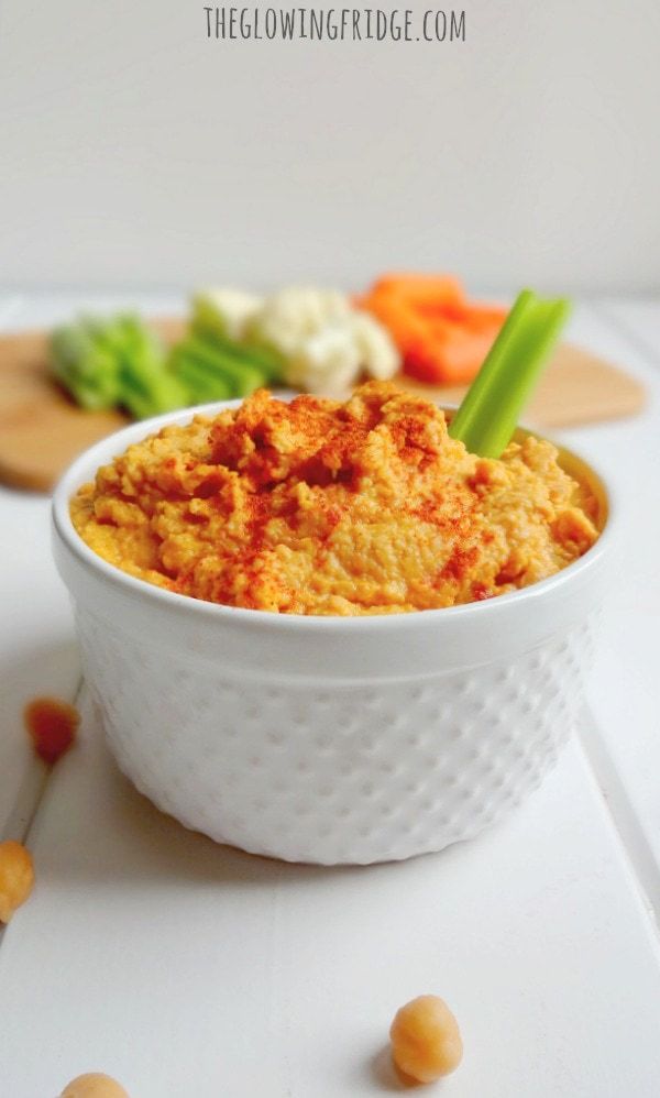 Skinny & Spicy Buffalo Dip that's low fat, vegan and gluten free! Perfect for game days, appetizers or snacks. Works great as a spread on a sandwich or wrap. Creamy, spicy and ready in 5 minutes. From The Glowing Fridge.