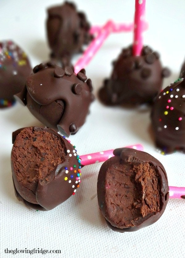 Chocolate Covered Brownie Pops - vegan + gluten free + no bake - secretly healthy and made from black beans. these darling luscious brownie pops are drenched in melted chocolate and are so easy to make!