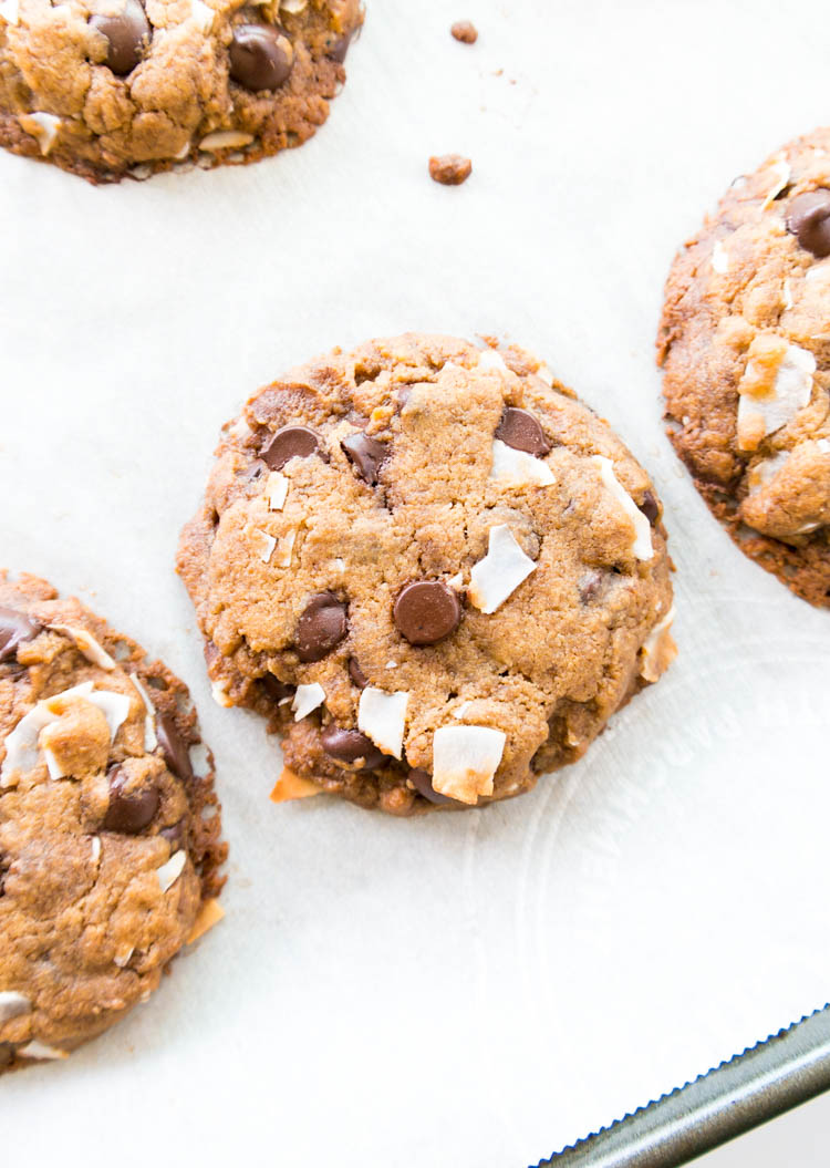 Vegan Chocolate Chip Coconut Cookies made with coconut oil. Gluten Free option. Golden and crispy on the outside while soft & chewy on the inside. The BEST vegan cookie, and ready in under 25 minutes! 