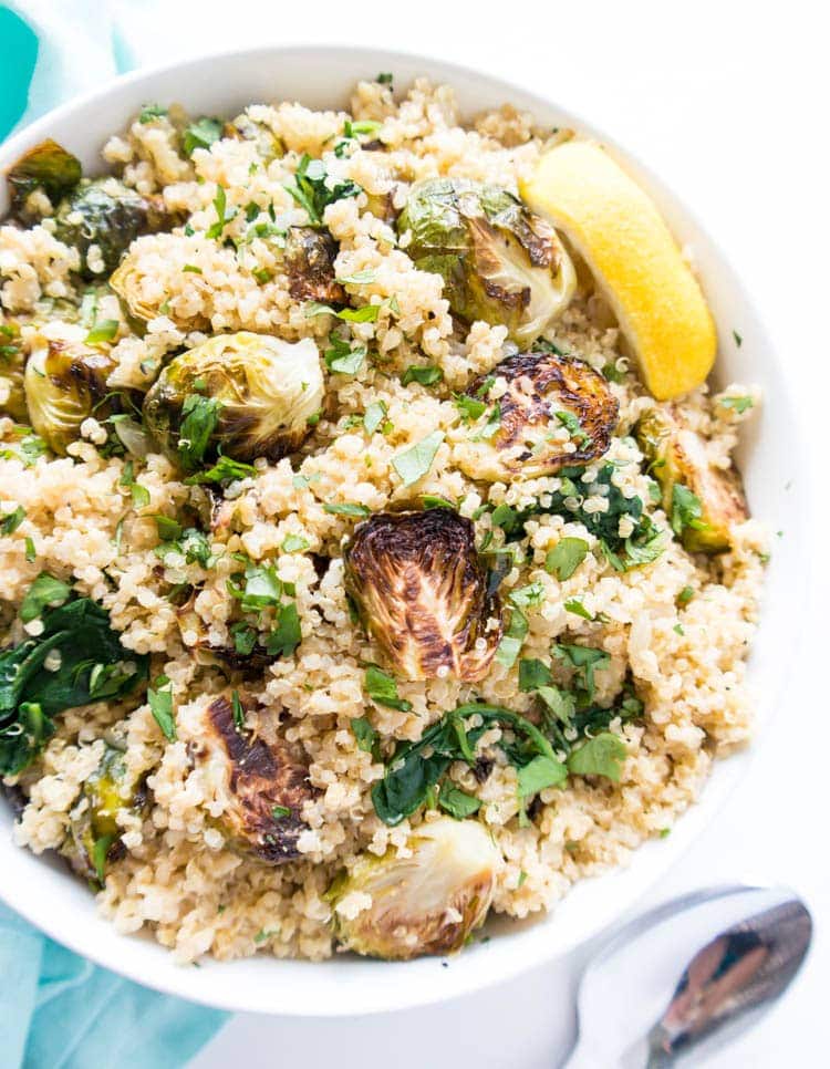 Vegan & Gluten Free. Lemony Quinoa Brussels Sprouts Salad. The perfect side dish or healthy lunch! Zesty and lemon-y with all the roasted brussels sprout goodness. Super simple to prepare too. #vegan #quinoa #salad #brusselssprouts