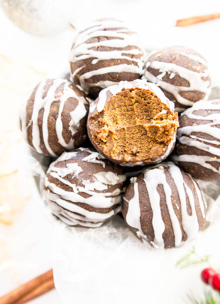 Raw Gingerbread No Bake Bites. Vegan, Gluten Free, Oil Free. Healthier sweet gingerbread treats with white icing and lots of gingerbread flavor. No equipment needed! Higher protein option too. #vegan #protein #balls #bites