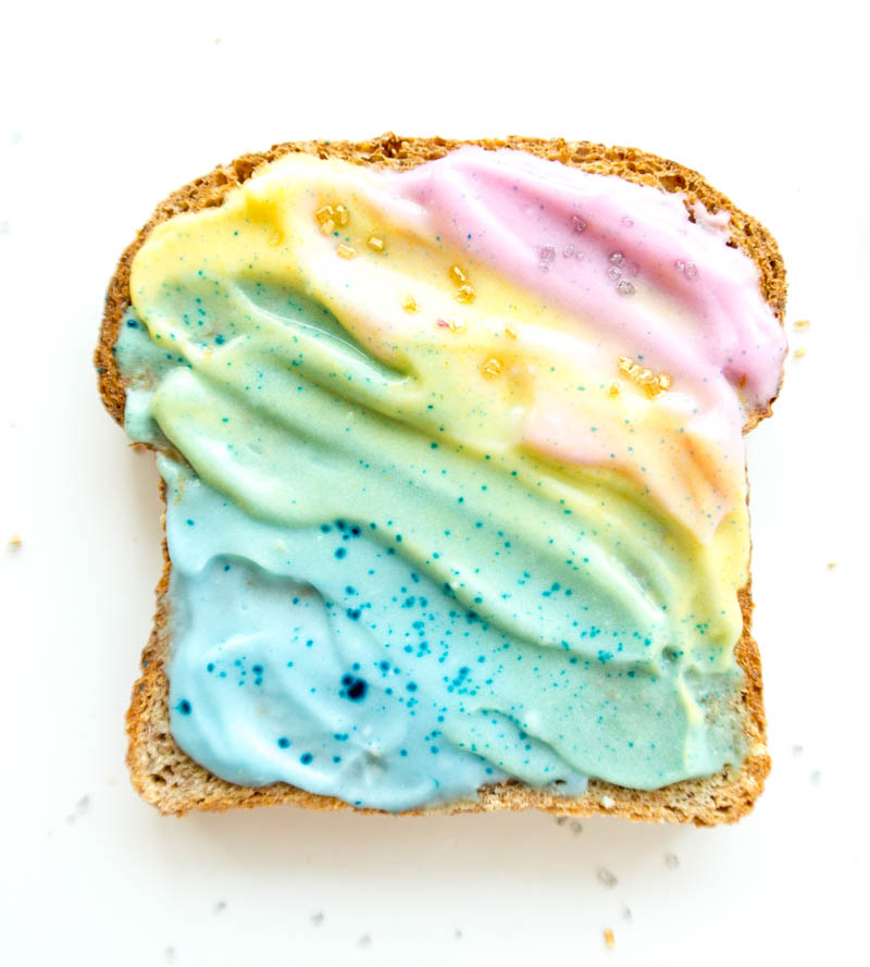 Unicorn Toast. Vegan with all natural food coloring options, from actual food! Swirled with coconut milk yogurt or dairy free cream cheese. Creative & fun breakfast or snack! #unicorn #toast #vegan