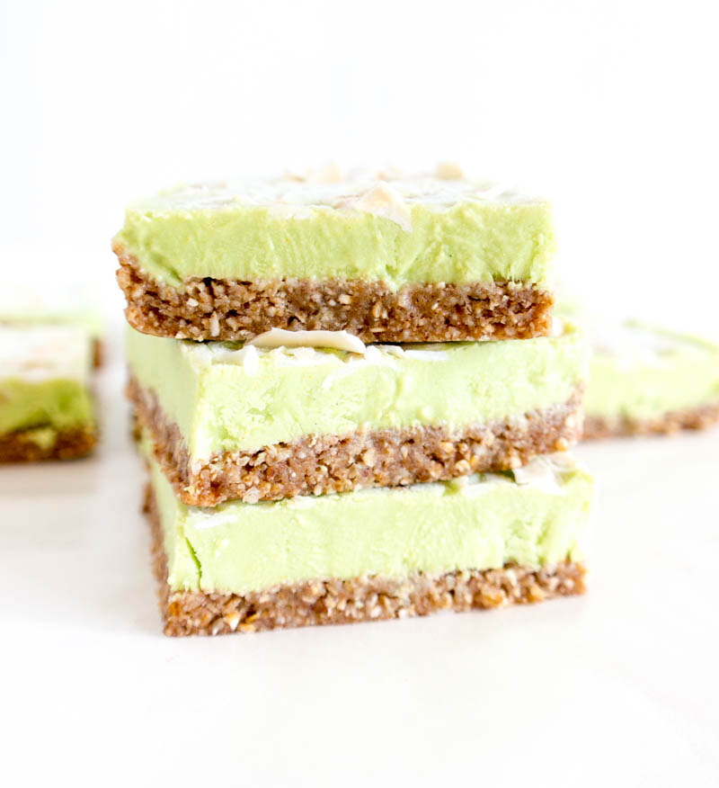 Key Lime Coconut Dream Bars. Vegan, Gluten Free, no refined sugars and colored naturally with spirulina & turmeric! The perfect cold, light and tart summer treat or dessert. #vegan #keylime #coconut #bars #dairyfree