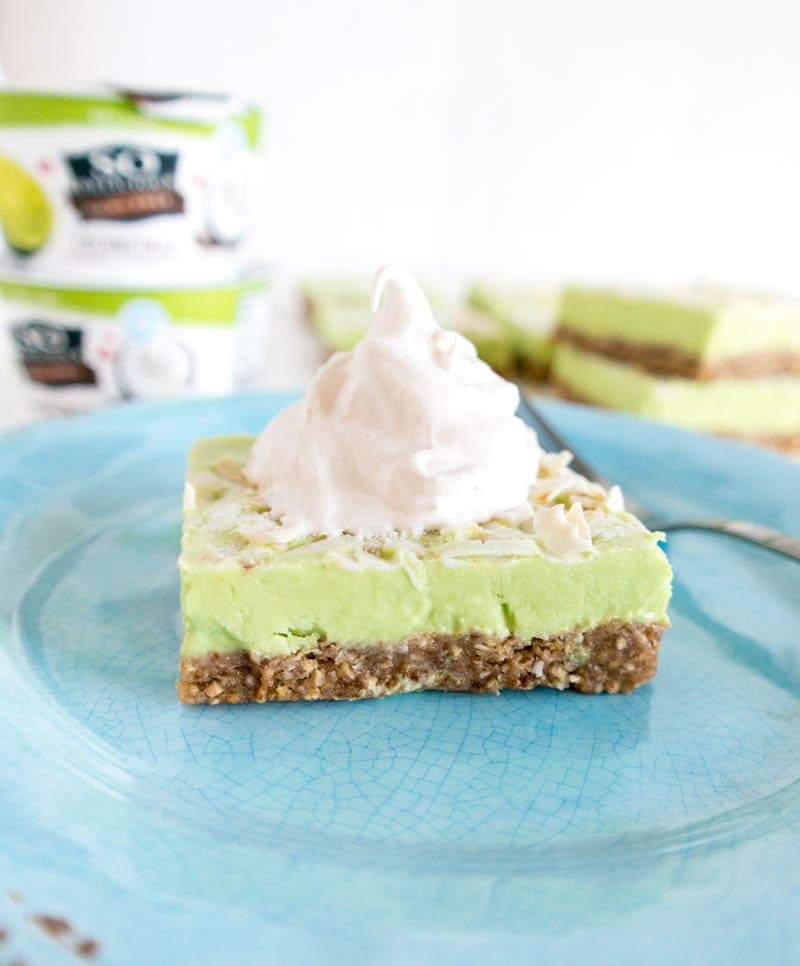 Key Lime Coconut Dream Bars. Vegan, Gluten Free, no refined sugars and colored naturally with spirulina & turmeric! The perfect cold, light and tart summer treat or dessert. #vegan #keylime #coconut #bars #dairyfree