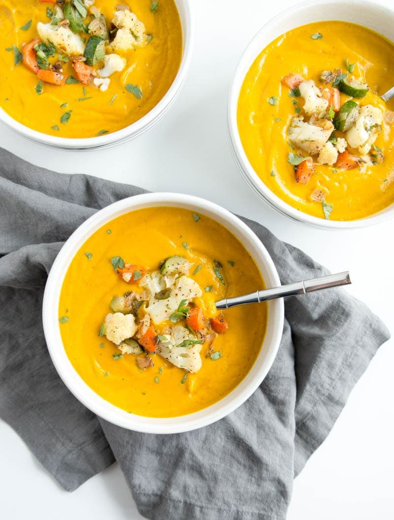 SPICY VEGAN PUMPKIN SOUP, with hidden veggies! Luxuriously smooth and velvety rich. Gluten Free and great for meal prepping. #vegan #soup #pumpkin #spicy