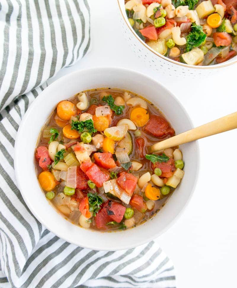 Spiced Vegan Minestrone Soup. Brothy, herby and packed with bright flavor. This warming & comforting soup feels healing and cozy, and comes together quickly! #vegan #minestrone #soup #winter