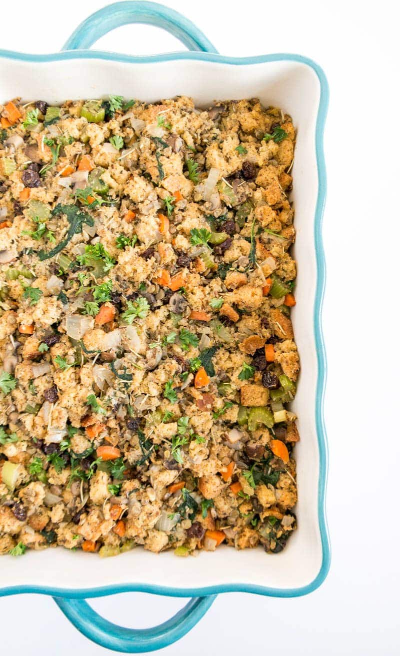 Veggie Herb Vegan Stuffing. Perfectly flavored and savory sweet for Thanksgiving! Made with protein-packed lentils, carrots, celery, mushrooms and raisins for a wholesome #vegan Stuffing! #thanksgiving #stuffing