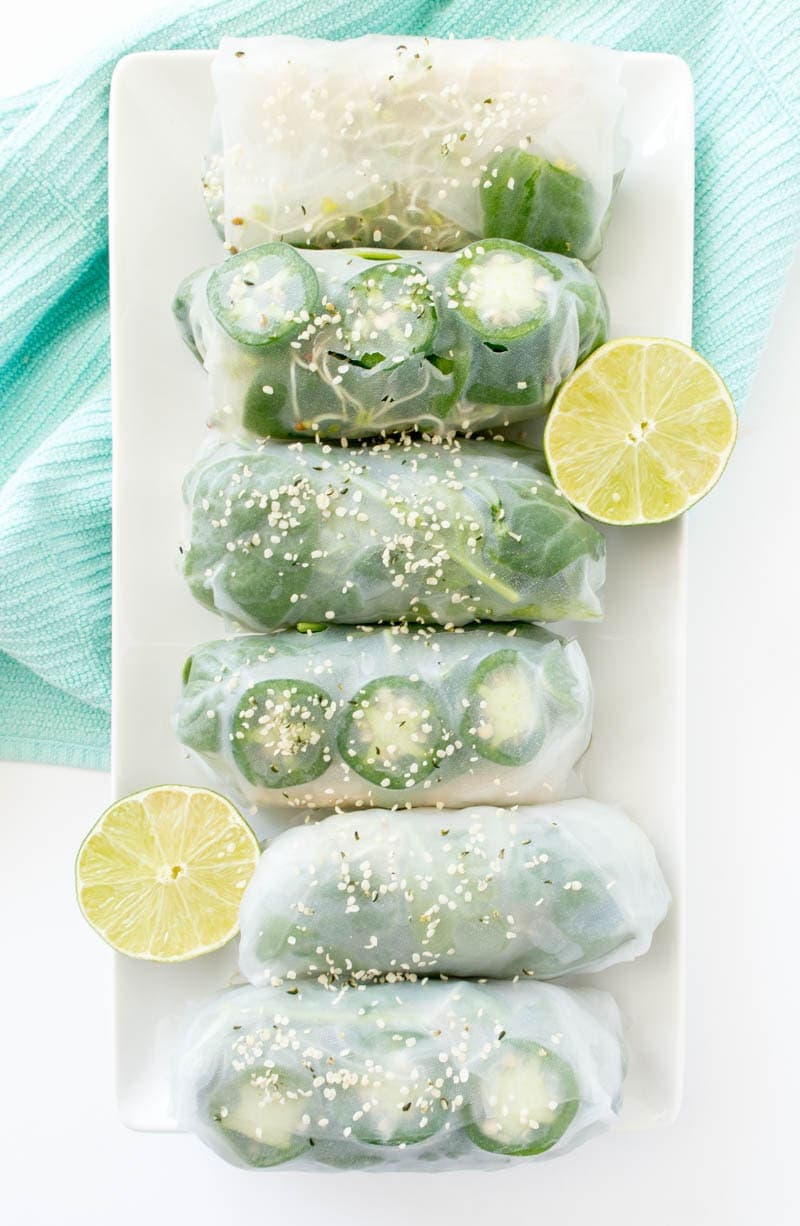 Mermaid Babe Summer Rolls. Vegan and gluten free summer rolls that are light and fresh but also filling! Packed with leafy greens, crunchy veggies and protein-rich tempeh for a nourishing, bikini-friendly meal. Alongside a mint-colored Mermaid Miso Dipping Sauce! From The Glowing Fridge. #vegan #plantbased #mermaidrolls #springrolls