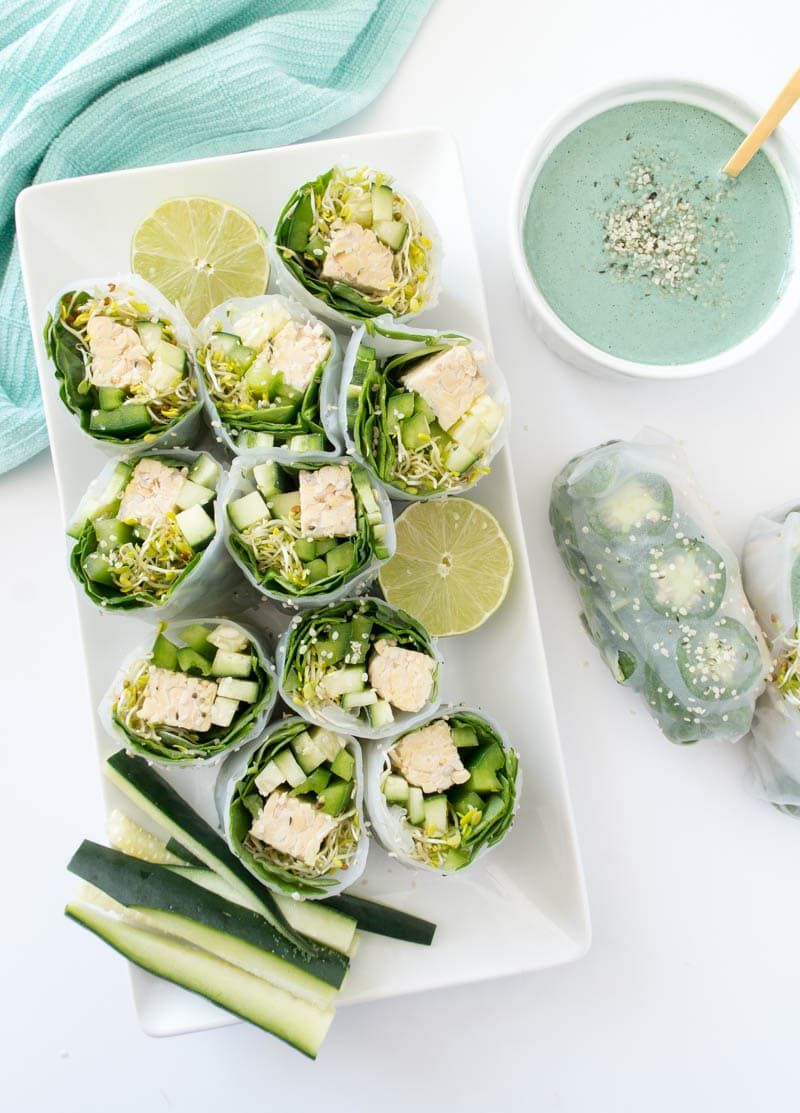 Mermaid Babe Summer Rolls. Vegan and gluten free summer rolls that are light and fresh but also filling! Packed with leafy greens, crunchy veggies and protein-rich tempeh for a nourishing, bikini-friendly meal. Alongside a mint-colored Mermaid Miso Dipping Sauce! From The Glowing Fridge. #vegan #plantbased #mermaidrolls #springrolls
