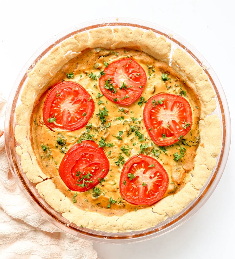 Vegan Vegetable Quiche. Eggless with an option for a gluten free homemade pie crust. Easy quiche recipe made with tofu, veggies, spices and herbs. It has a beautiful taste and texture. #vegan #quiche #recipe #brunch #mothersday #easter