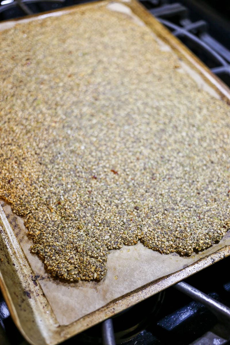 spicy gluten free seed cracker recipe. spicy seed crackers recipe. pumpkin seeds (pepitas), sunflower seeds, sesame seeds, chia seeds. nut free! super simple and fun to make. #glutenfree #crackers #seeds