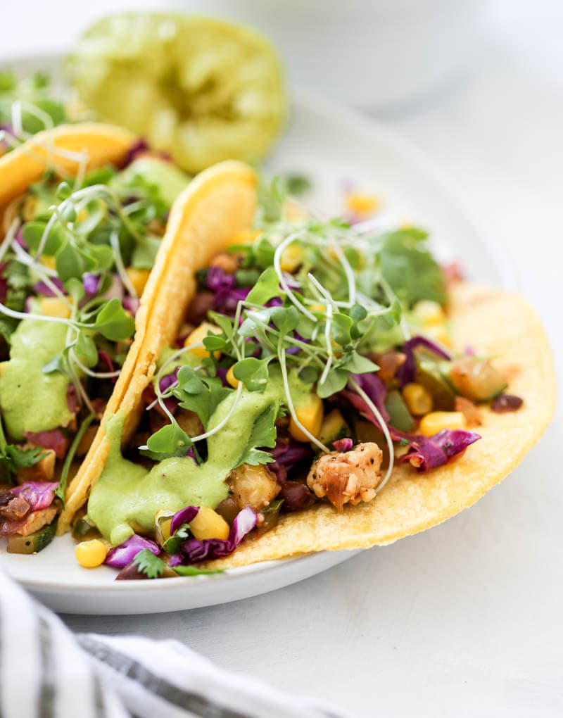 Tequila Lime Vegan Tacos. Plant based, simply delicious, gluten free tequila-infused tacos. Fresh veggies, herbs and spices with black beans and tempeh! #mexican #tequila #tacos #vegan
