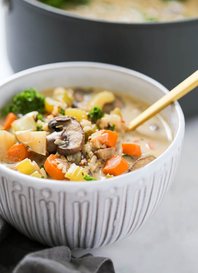 Vegan Wild Rice Mushroom Soup. A scrumptiously perfect blend of cozy and nourishing, all in one-pot! Creamy from the cashew cream, with lots of veggies. #vegan #wildrice #mushroom #soup 